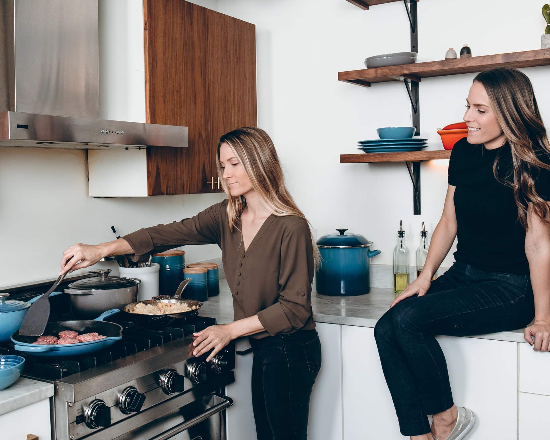 https://www.repaircare.ca/wp-content/uploads/2016/04/two-women-cooking-on-stove.jpg